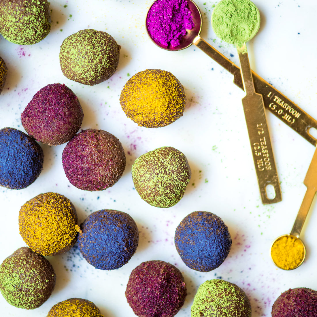 Suncore Foods Treat yourself to some colorful Rainbow Dusted Chocolate Cacao Nibs Truffles!