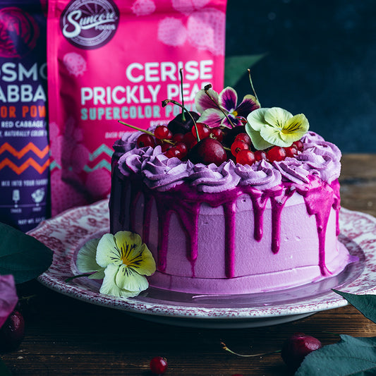 Suncore Foods Fruit Cake with Cerise Prickly Pear Glaze & Cosmos Red Cabbage Whipped Cream